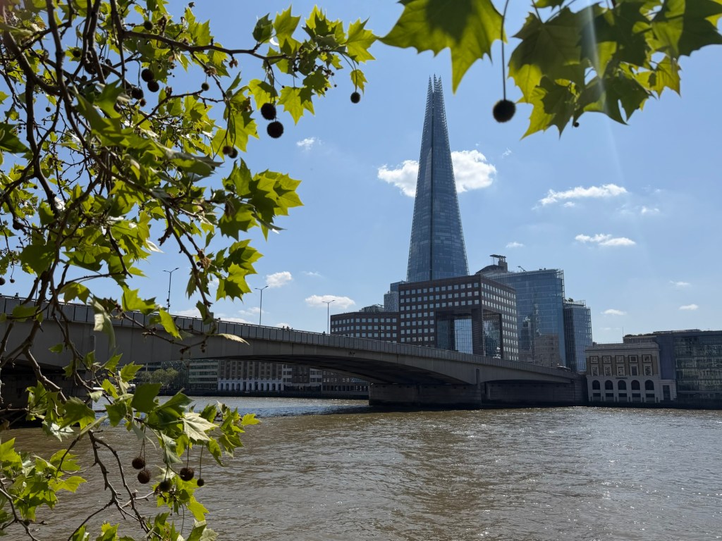 Photograph taken from north bank of the River Thames on a sunny April day in 2026. Showing London Bridge and the Shard